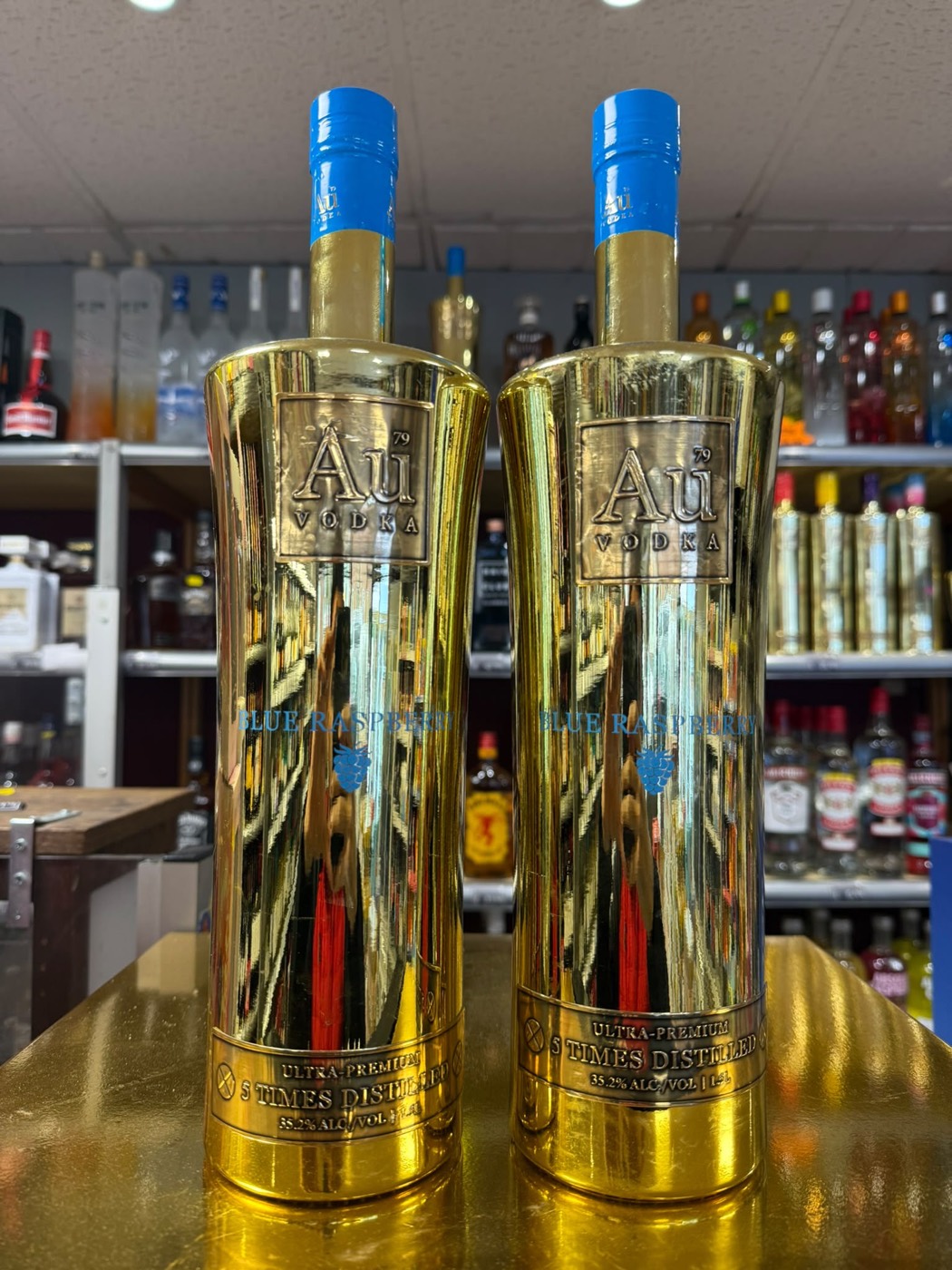 Au Vodka gold bottles